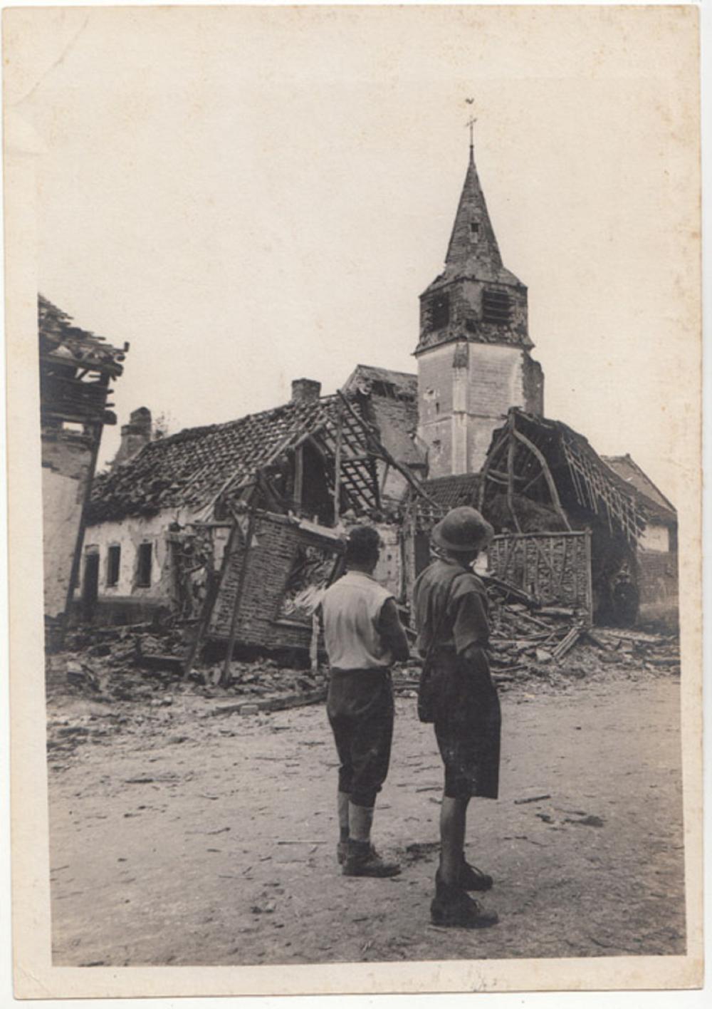 WWI Australia Contemporary War Photograph of 'Two unidentified soldiers looking at the ruins of the village church, Hamlet, 24th May 1918. View of the ruined Church of Villers-Bretonneux, May 1918'