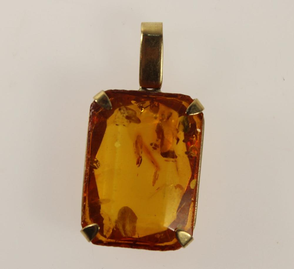 Amber Pendant with 9ct Yell... image