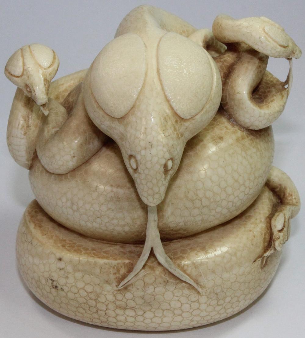 Intricately carved Netsuke ... image