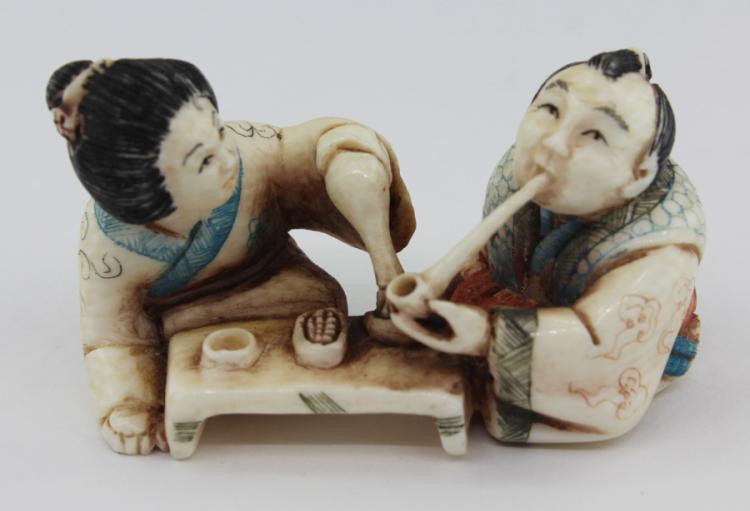 Japanese Netsuke of a Man &... image