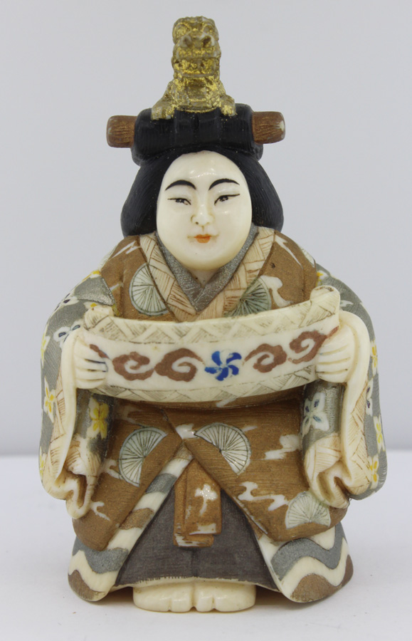 Japanese Netsuke of a Man r... image