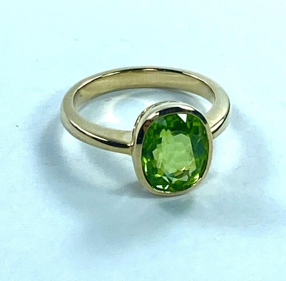 Oval-faceted Peridot Ring i... image