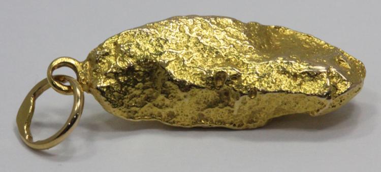 Mounted Gold Nugget on an 1... image