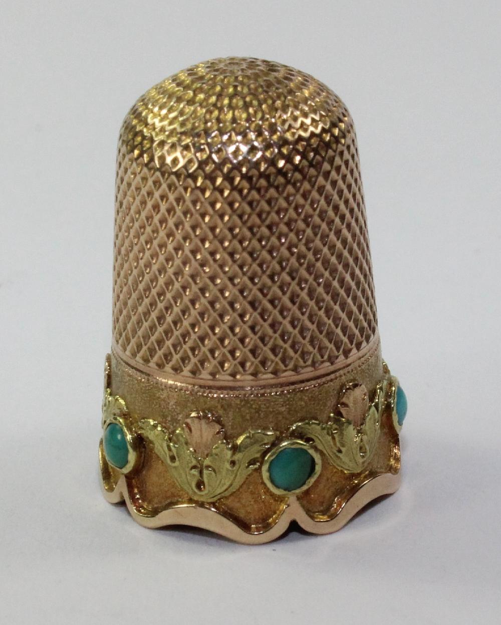 Thimble in 14ct Gold with T... image