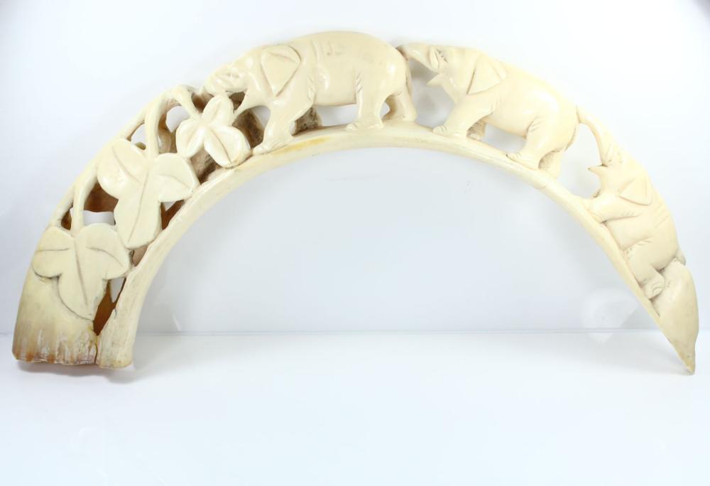 Pig Tusk carving of linked ... image