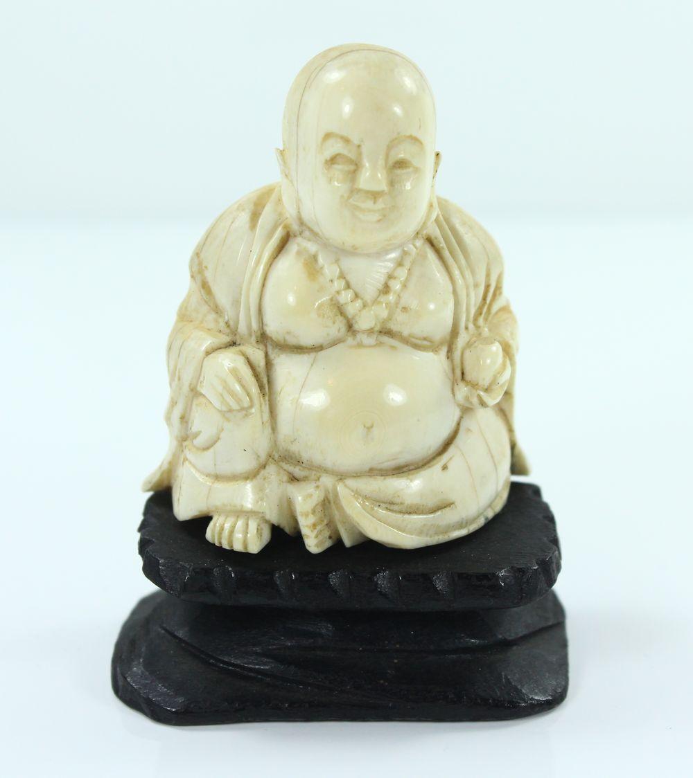 Chinese carving of Buddha a... image