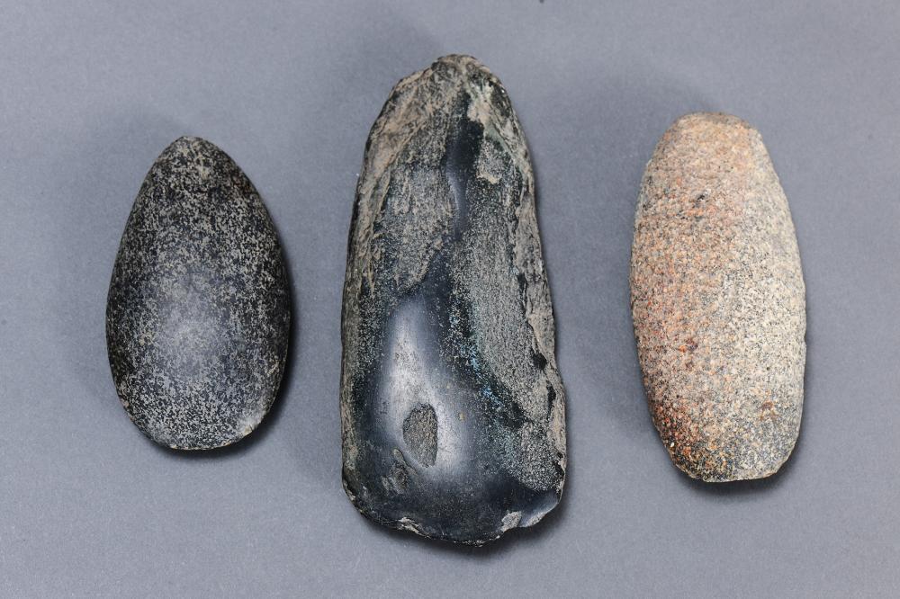 A COLLECTION OF THREE STONE... image