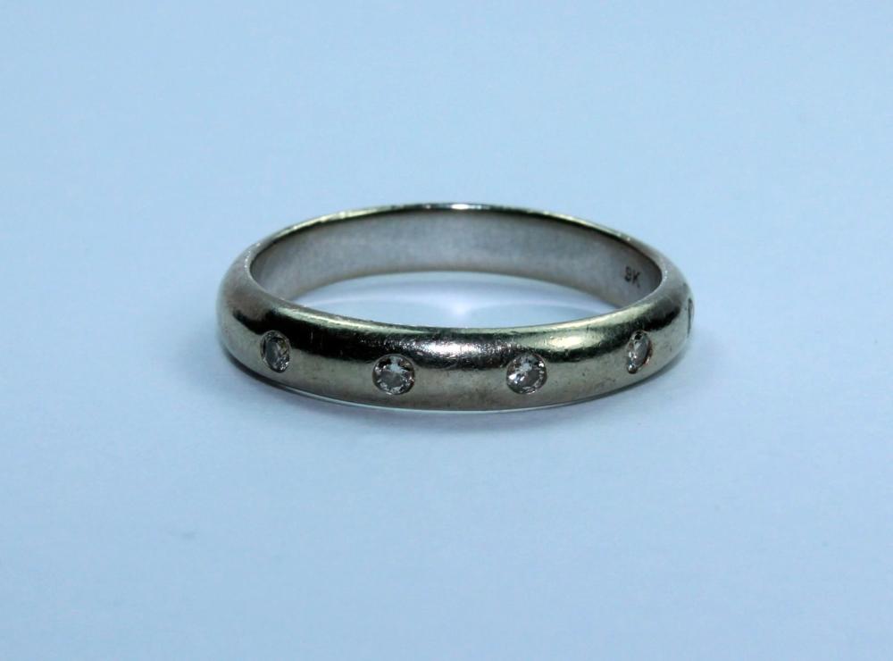 Band with inset Diamonds in... image