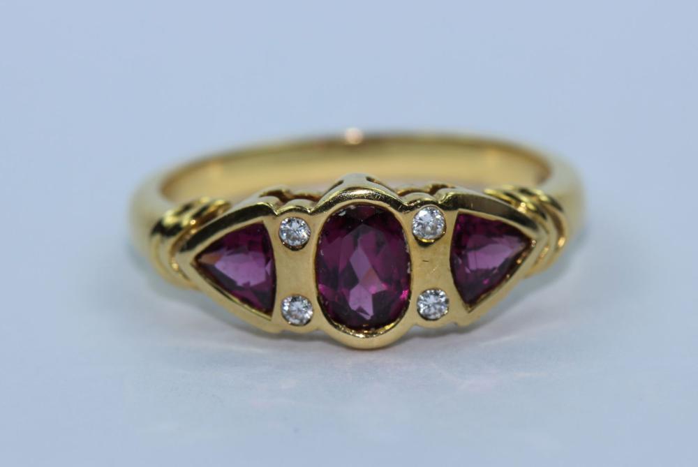 Modern Garnet Ring in 18ct ... image