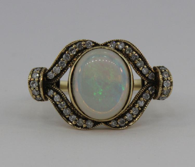 Solid Opal and Diamond 9ct ... image